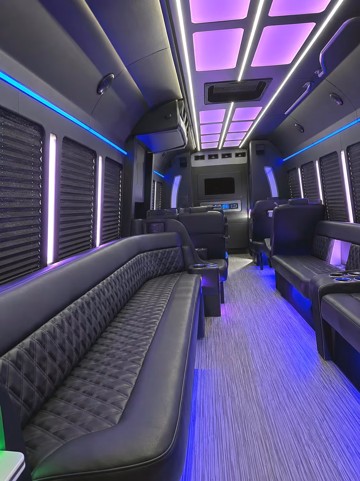 Wedding guests seated inside a party bus serving Reno